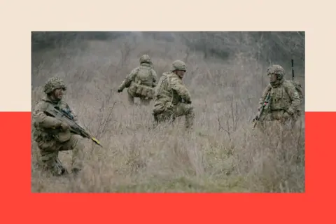 Getty Images British soldiers practice retreat under fire during an exercise