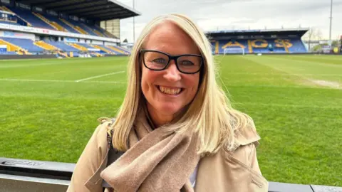 Woman at football club