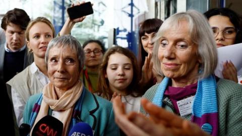 Anne Mahrer and Rosmarie Wydler-Walti, of the Swiss elderly women group Senior Women for Climate Protection, talk to journalists after a historic ruling in their favour by the European Court of Human Rights in Strasbourg, France.