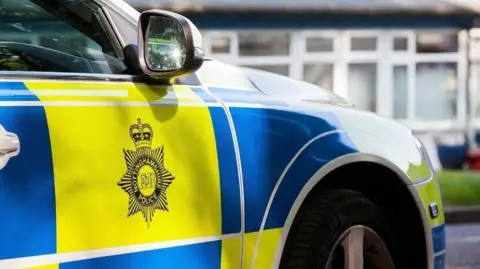 Photo of police car saying Nottinghamshire Police on the side