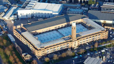 Getty Images An art deco, brown brick building with tower pictured from above.