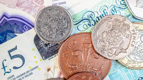 Getty Images Banknotes and coins