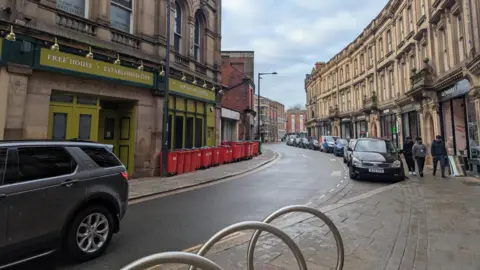 Bar on the Strand which curves to the left