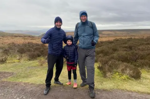 Jon Madden Jon Madden with son Hughie and friend Craig Thomas on their fundraising walk