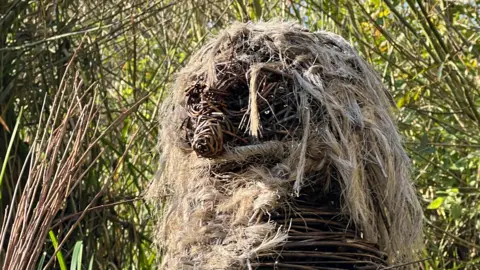 The 'Tiddy Mun' sculpture woven from willow and hemp 