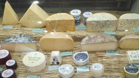 PS8/UK FDEA British cheese on display.