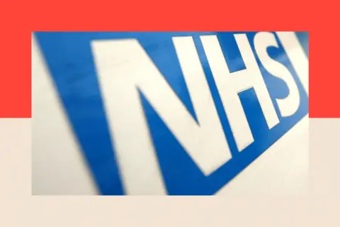 PA Media A sign showing the NHS logo