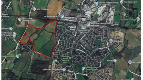 Tunbridge Wells Borough Council An aerial shot with an outline map for an estate of 500 homes near Paddock Wood