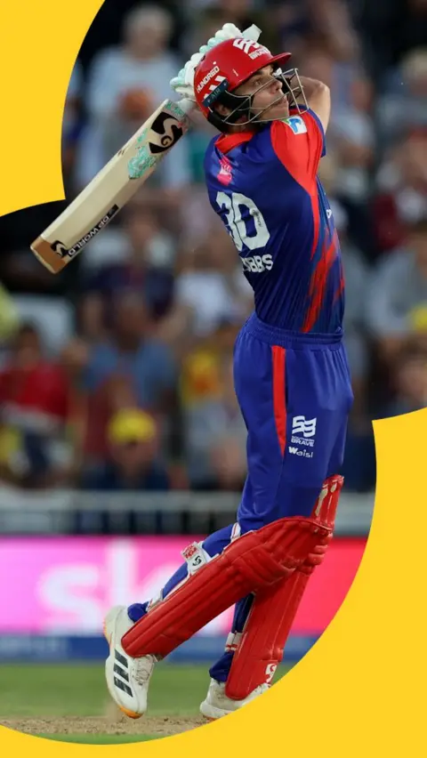 Tristan Stubbs mid-swing after sending the ball for a six