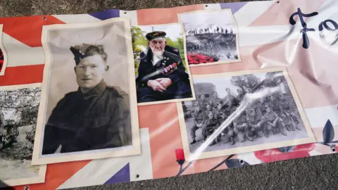 Jacob King/PA Wire Photos of Donald on top of a Union Jack flag