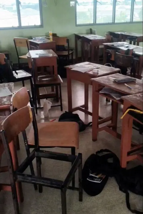 Reuters Students' belongings and furniture scattered in a classroom, following a shooting incident at Debsirin Nonthaburi School