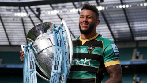 Courtney Lawes holds the Premiership trophy