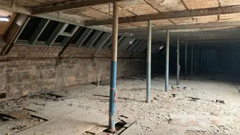 The Alexander Thomson Society A shot of the interior. The floor is dirty with supporting columns for the roof