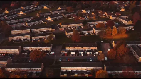 Flagship Group We can see the Abbey Estate from the air. There are several blocks of flats.