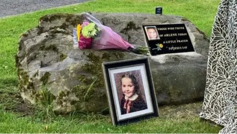 Memorial stone dedicated to Arlene Arkinson