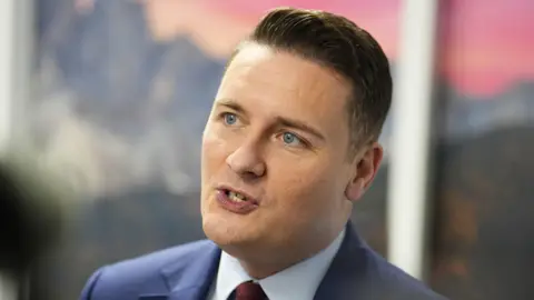 Health official speaking to media