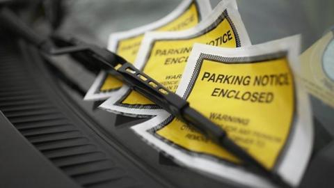Parking notice on a car windscreen