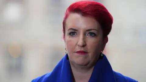 Transport Secretary Louise Haigh wearing a blue coat as she arrives at BBC Broadcasting House in London.