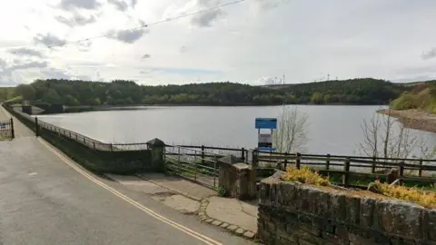 A Google Map screenshot of a reservoir with a concrete footpath running alongside it.