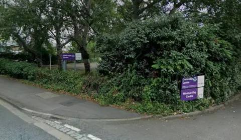 A Google Maps picture of Oakbridge and Windsor Day Centres from Imperial Road in Windsor. The view of one of the centres is largely obscured by a hedge.