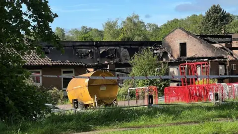 Paul Jirgens/BBC Burnt out building in Ampthill