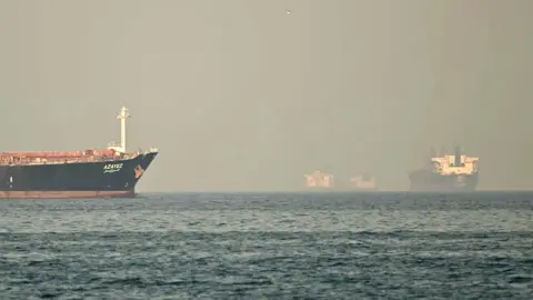 Getty Images Vessels transit the Strait of Hormuz