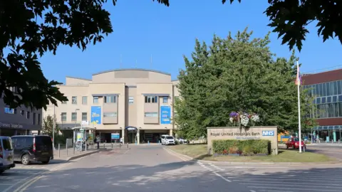 RUH An exterior view of the Royal United Hospital in Bath on a sunny day.