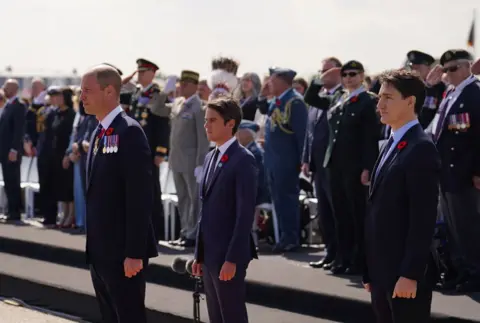 Jordan Pettitt/PA The Prince of Wales, Prime Minister of France Gabriel Attal and Canadian Prime Minister Justin Trudeau at the Government of Canada ceremony to mark the 80th anniversary of D-Day, at Juno Beach in Courseulles-sur-Mer, Normandy, France. Picture date: Thursday June 6, 2024. 