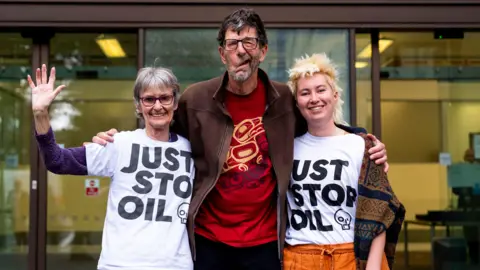 From left: Just Stop Oil activists Mary Somerville, Stephen Simpson and Phillipa Green leaving Westminster Magistrates' Court