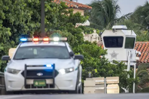 A police car outside Trump's golf course