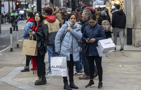 Shoppers on UK high street