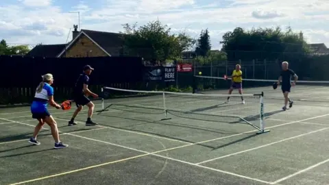 Castor and Ailsworth Tennis Club Four people playing pickleball