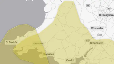 Met Office A weather map showing where the two yellow warnings cover. The map is showing Wales and parts of England. 