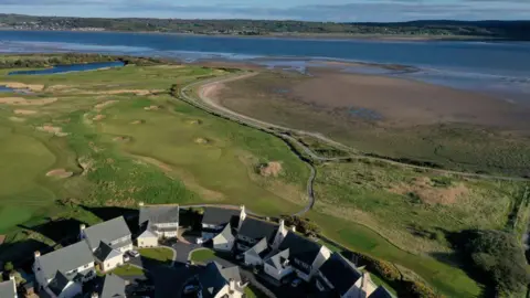 David Cannon/Getty Images An aerial view looking over a housing estate near the Machynys Golf Club in Llanelli, Wales.