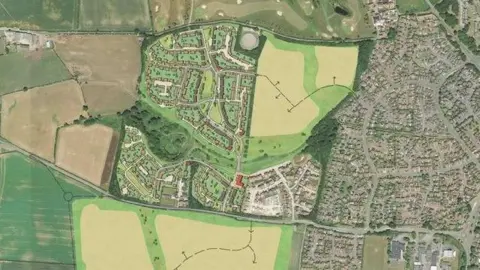 An aerial view of an artists' impression of a housing development in a field next to an existing development. There is a large green field in one corner, and the rows of streets with houses drawn on.