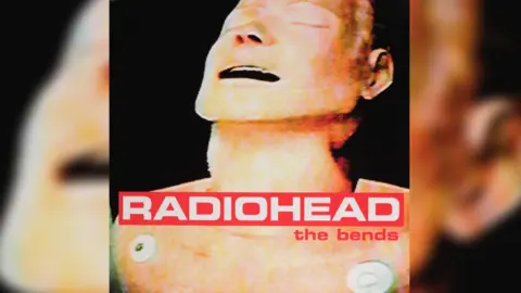 Stanley Donwood and Thom Yorke The album cover for Radiohead's 1995 album 'The Bends' is a pixelated head and shoulders image of, what looks like, a topless man with his eyes closed, mouth open and head tilted back. "RADIOHEAD the bends" is printed along the bottom third of the image in red and white.