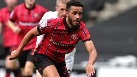 George Hall in action for Walsall in the EFL Trophy