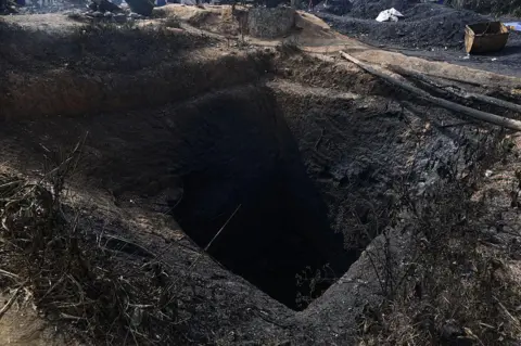 Hafiz Ahmed/Anadolu via Getty Images A view of Coalmine Pit where at least 18 labourers were killed in a blast at an illegal coal mine in Meghalaya's east Jaintia Hills district, India on February 6, 2026. 