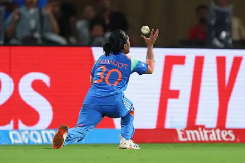 Alex Davidson-ICC/ICC via Getty Images NAVI MUMBAI, INDIA - NOVEMBER 02: Amanjot Kaur of India takes the catch to dismiss Laura Wolvaardt of South Africa (not pictured) during the ICC Women's Cricket World Cup India 2025 Final match between India and South Africa at Dr. DY Patil Sports Academy on November 02, 2025 in Navi Mumbai, India. (Photo by Alex Davidson-ICC/ICC via Getty Images)