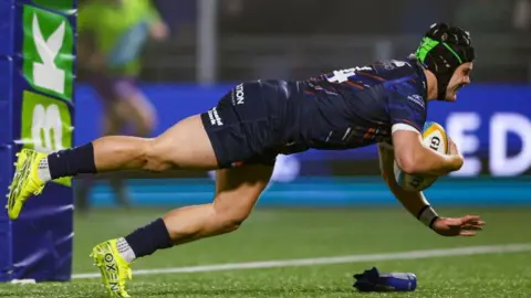 Edinburgh's Darcy Graham scores a try