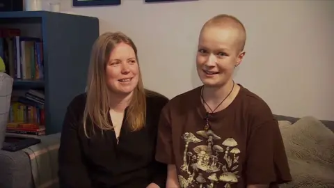 Liz Hatton sits beside her smiling mother