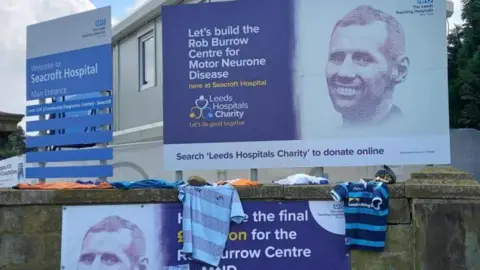 Signs promoting the campaign to build the Rob Burrow Centre for Motor Neurone Disease, at Seacroft Hospital in Leeds.
