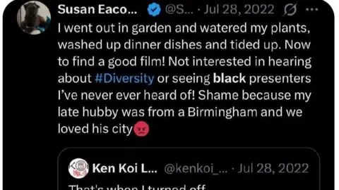 X A message that appeared on X. In it, Susan Eacock writes "I went out in garden and watered my plants, washed up dinner plates and tidied up. Now to find a good film! Not interested in hearing about #Diversity or seeing black (word in bold) presenters I've never ever heard of! Shame because my late hubby was from a Birmingham and we loved his city."