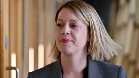 A head and shoulders shot of Jenny Gilruth in the Scottish Parliament