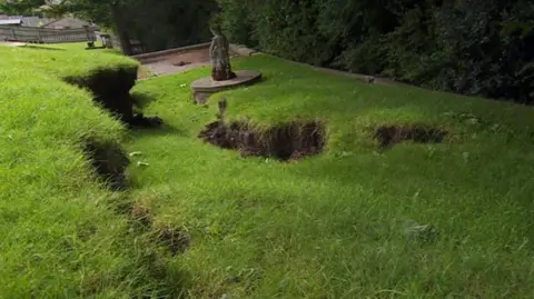 Subsidence at a garden and driveway in George Street, Sutton-in-Ashfield, Nottinghamshire