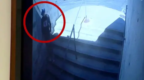 Tyler Robinsons is seen walking down some stairs.