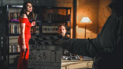 Newcastle Film Club Sarah Seymour and Mark Burns on the set of NAILS