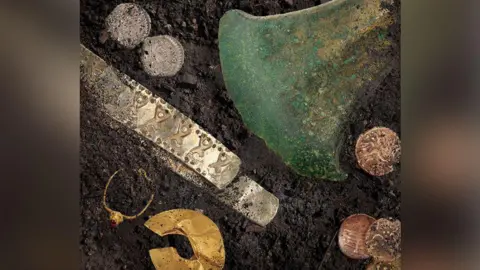 Museum of Liverpool handout Artefacts from the Bronze Age gold and Viking silver to hoards of coins and jewellery in soil on display at the Museum of Liverpool.