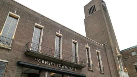 An exterior view of the newly restored town hall building.