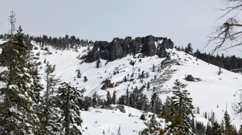 The top of Castle Peak, site of a deadly avalanche in the Sierra Nevada mountains near Soda Springs, California, on 21 February 2026.
